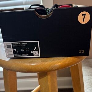 Nike Black and Green Sneakers with Red Accents